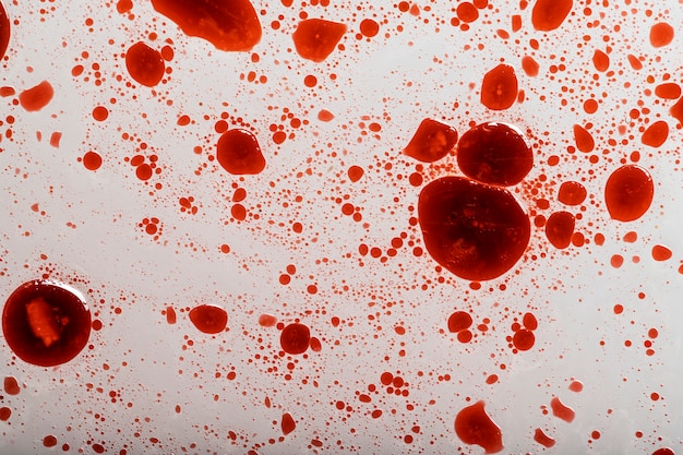 Blood splatters on white surface