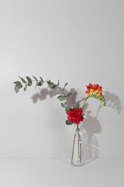 Blossom flowers in vase on table