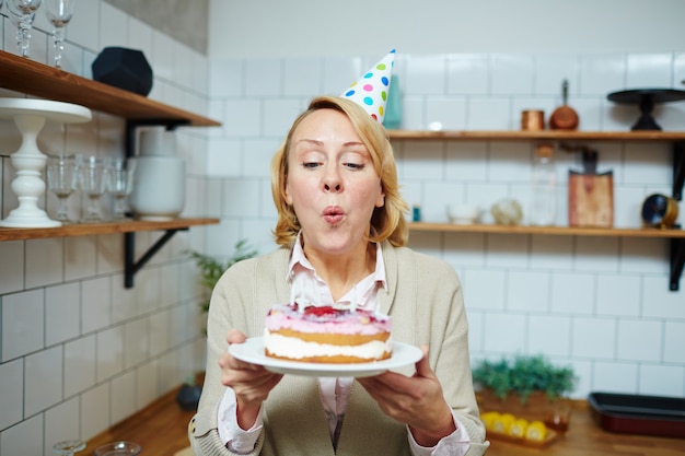 Free photo blowing candles