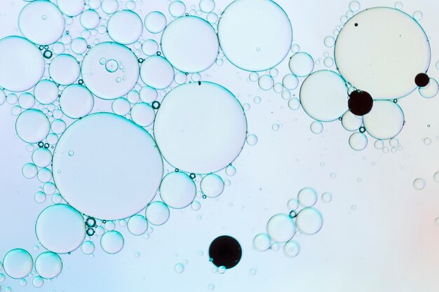 Blue abstract bubbles with black dots