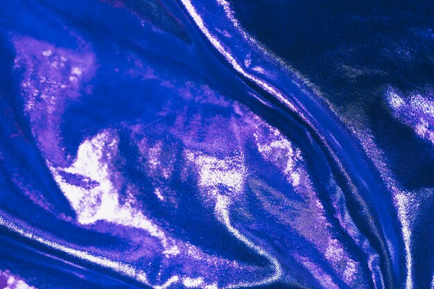 Blue abstract shiny material in background