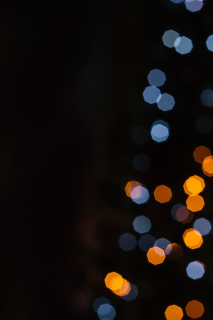 Бесплатное фото Синие и оранжевые рождественские огни