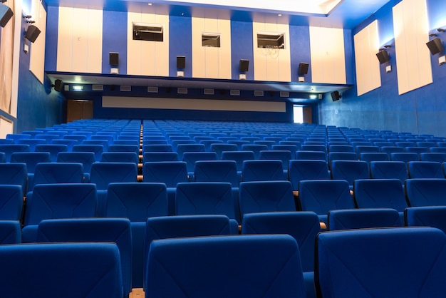 Blue arm-chairs in cinema