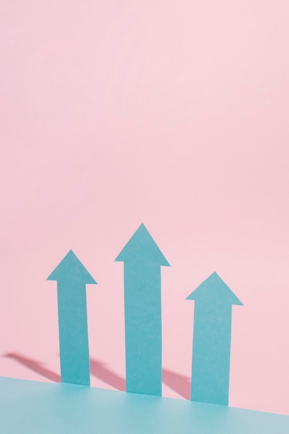 Free Photo blue arrows with pink background