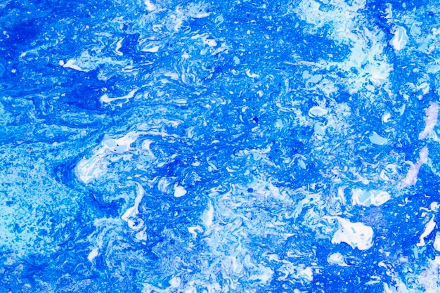 Blue background with abstract blots