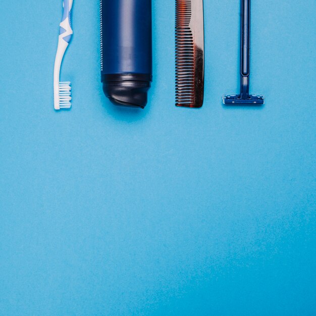 Blue bathroom composition with space on bottom