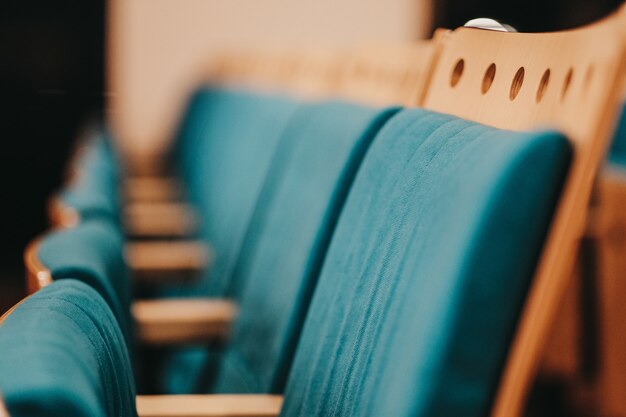 Blue and beige chairs next to each other