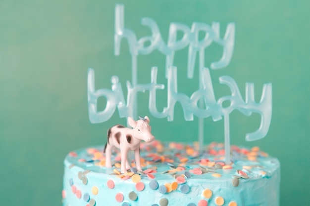Blue birthday cake with cow