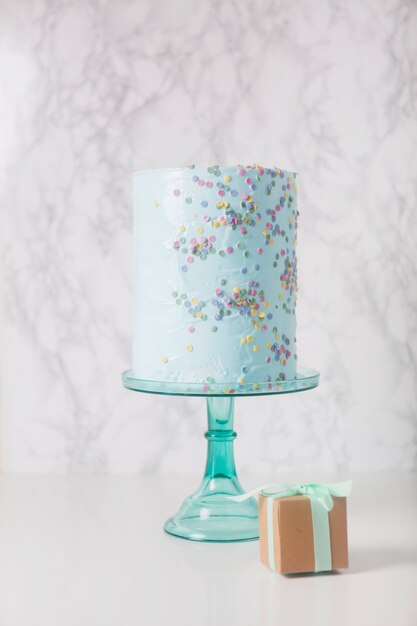 Blue birthday cake with gift