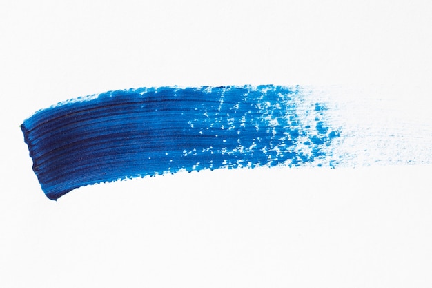 Blue brush stroke on white background