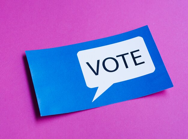 Blue card with vote speech bubble on purple background