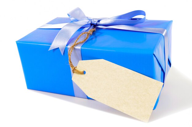 Blue christmas gift with gift tag 