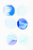 Free photo blue circle pattern made with watercolor brush stroke