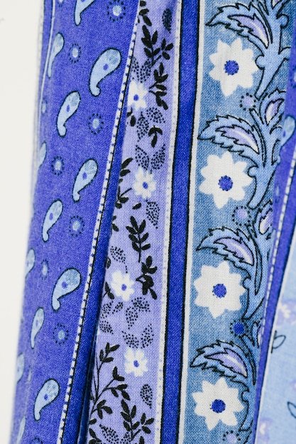 Blue cloth with flowers close-up