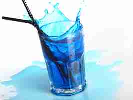 Free photo blue cocktail with splashes isolated on white