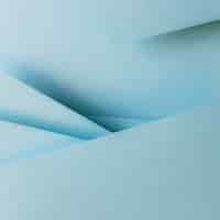 Бесплатное фото Синий цвет бумаги геометрии композиции баннер фон