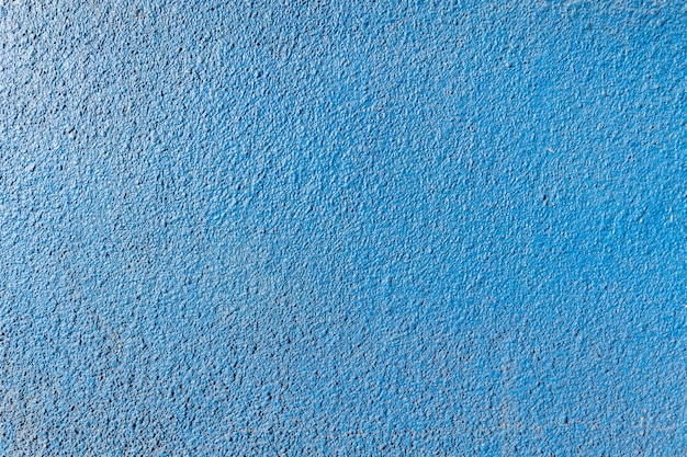 Foto gratuita priorità bassa di struttura del muro di cemento blu