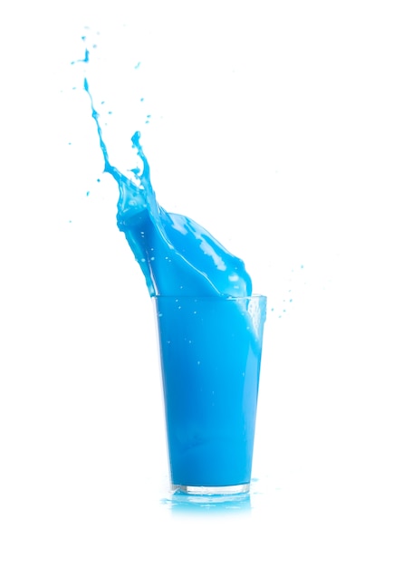 Blue drink falling in ice