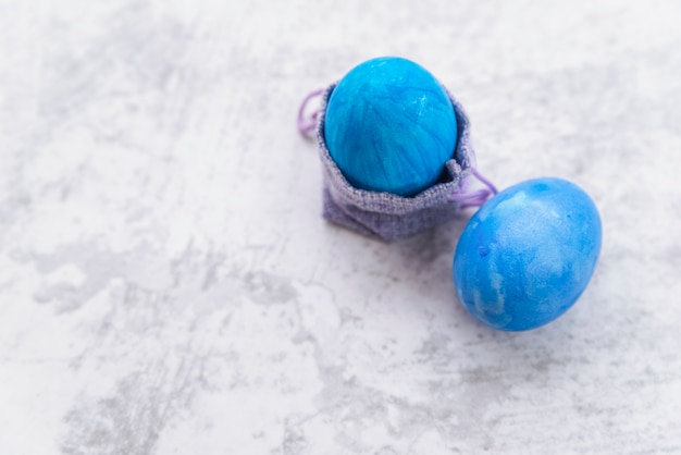 Blue Easter eggs and decorative bag