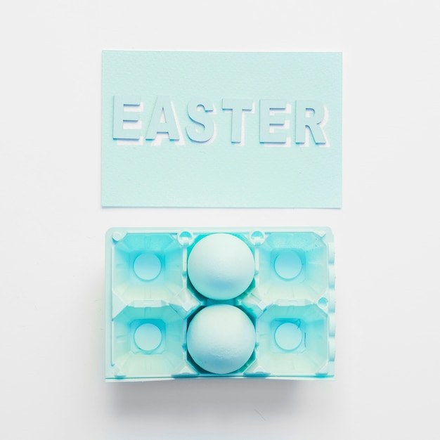 Blue egg and easter word