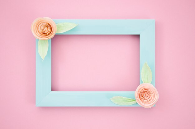 Blue elegant floral frame on pink background