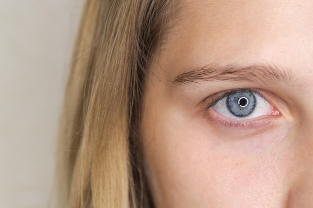 Blue eyes and blonde hair woman