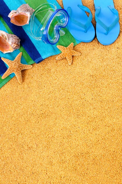 Blue flip flops on the beach