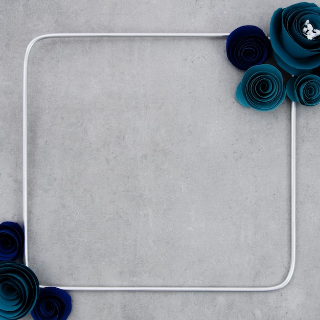 Blue floral frame on cement background