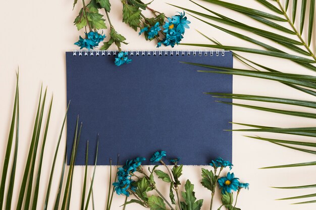 Blue flowers and notepad