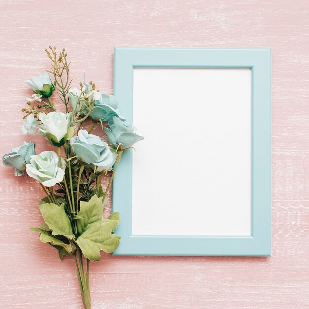 blue frame with bouquet of peonies