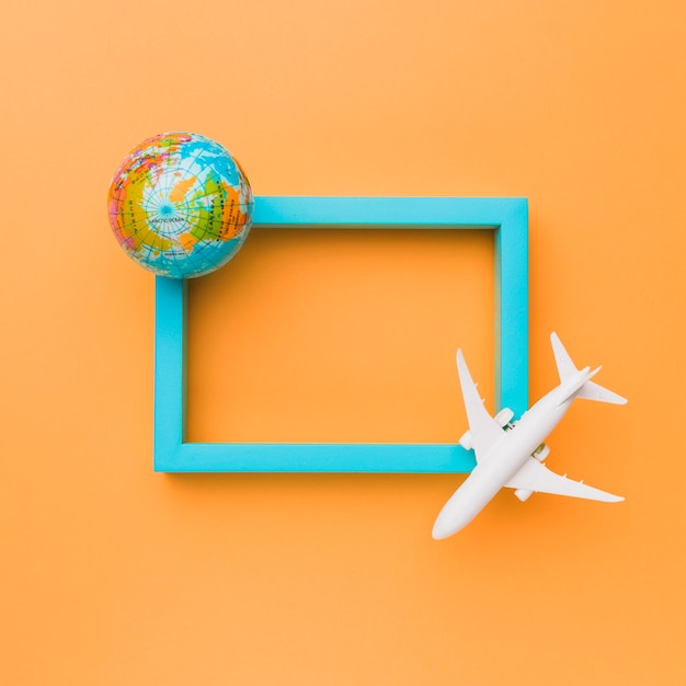 Blue frame with plane and globe