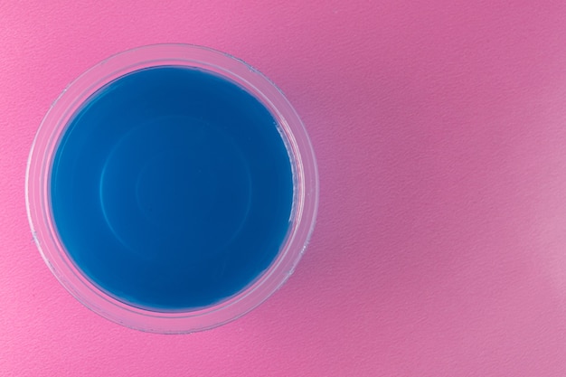 Blue gelatin on the pink surface