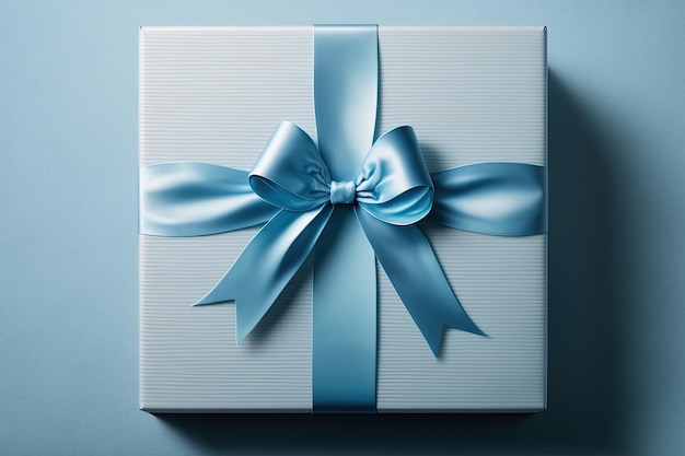 Бесплатное фото Синяя подарочная коробка с синим бантом на синем фоне вид сверху ai генеративный