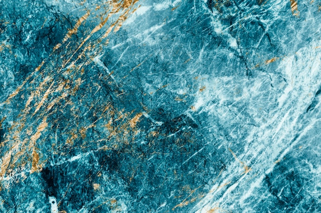 青と金の大理石の織り目加工の背景