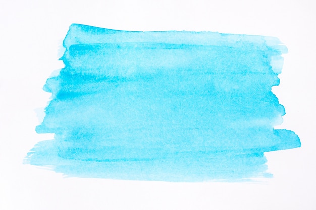 Blue lines of brush painted on white background