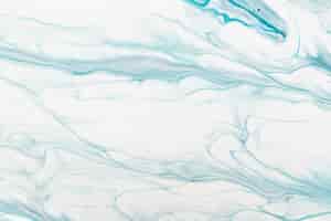 Free photo blue liquid marble background diy flowing texture experimental art