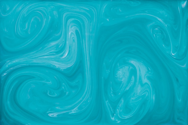 Blue liquid marbling paint background