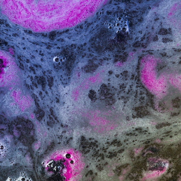 Blue liquid with pink foam