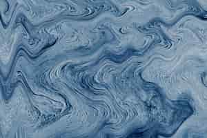 Free photo blue marbled paint texture