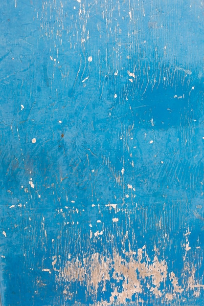 Blue paint of rough wood surface