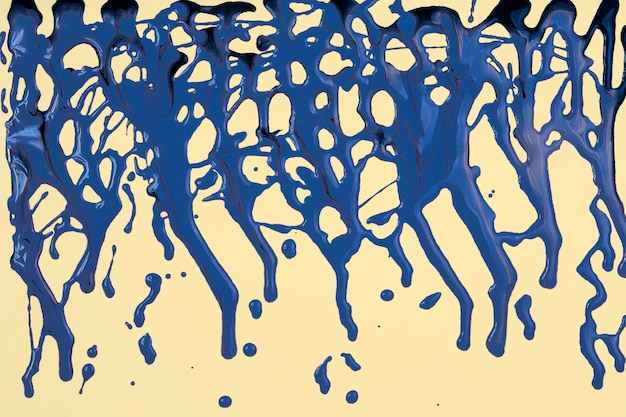 Blue paint spilled on yellow