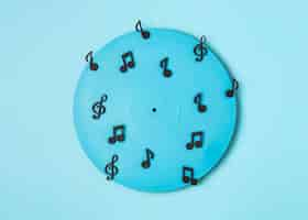 Free photo blue painted vinyl arrangement with musical notes