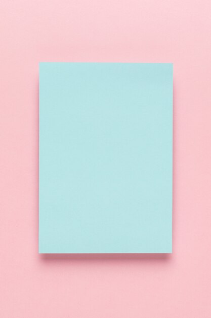 Blue paper on pink