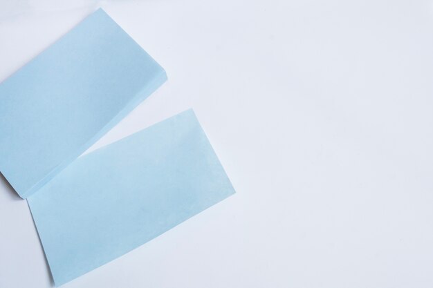 Blue papers on white