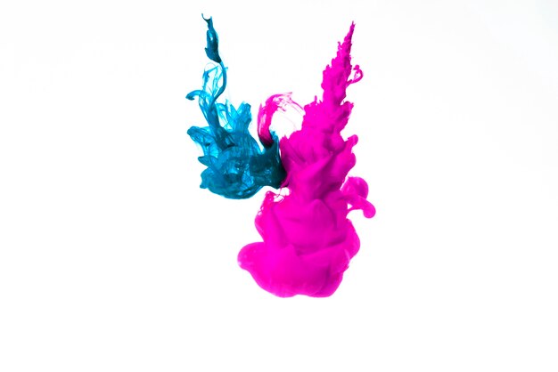 Blue and pink clouds of ink
