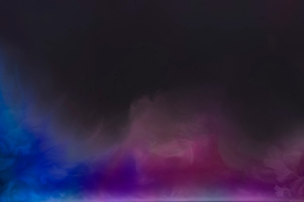 Blue and pink gradient smoke on dark room