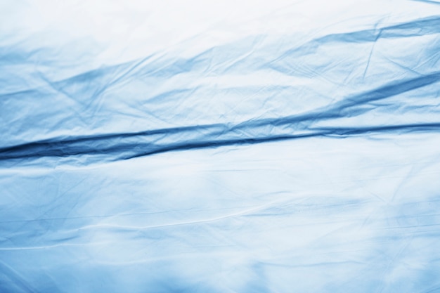 Free photo blue plastic bag texture close up