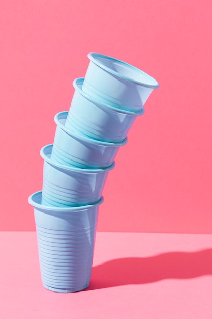 Blue plastic cups in a pile