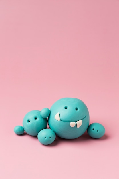 Blue play dough monsters arrangement