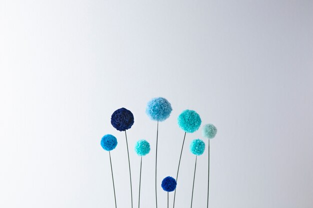 Blue pom poms arrangement above view